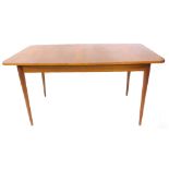 A 1960's teak extending dining table, on turned tapering legs, Scandinavian style, the top 83cm x