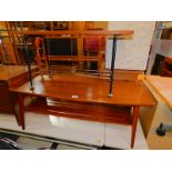 A 1970's stained ash coffee table, 40cm high, 104cm wide, 44cm deep., together with a 1950's teak