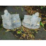 Two reconstituted stone statues, one of a seated man, the other a lady. (2)