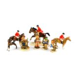 Four Hummel figures, including Apple Tree Girl and Apple Tree Boy, a Beswick foal, Hertwig figure of