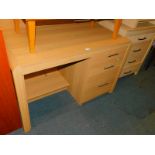 A Kingstown Furniture oak desk, with three drawer single pedestal, 75cm high, 117cm wide, 57cm