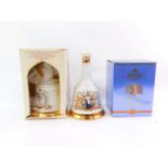 A Bells Whiskey decanter commemorating 100 Years Queen Elizabeth The Queen Mother, another