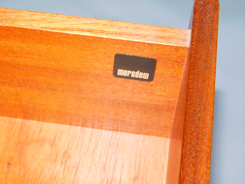 A Meredew teak chest, of seven long graduated drawers, raised on a plinth base, 113cm high, 102cm - Image 3 of 3