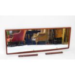 A G-Plan teak framed mirror, for wall or dressing table usage, 47cm high, 130cm wide.