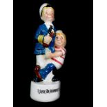 A 1950's drunken sailor musical decanter 'Splice The Main Brace', 32.5cm high.