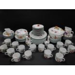 A Royal Worcester porcelain dinner and tea service, decorated in the Evesham Vale pattern, including