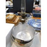 An aluminum jam pan, cake tin, Victorian etched glass globe and decanter, and a paraffin lamp. (4)