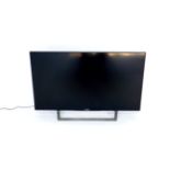 A Sony Bravia flat screen 43" colour television, model no KDL-43WD76, lacking remote.