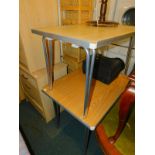 An aluminium folding table with Formica top, 70cm high, 91cm wide, 69cm deep., together with a