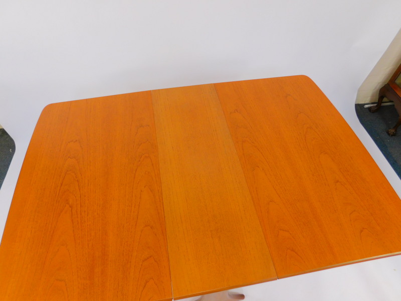 A G-Plan teak drop leaf dining table, 73cm high, 30.5cm wide, 137cm extended, 91cm deep., together - Image 4 of 4