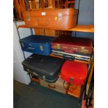 Five assorted suitcases, together with two brief cases. (7)