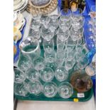 A Dartington suite of table glass ware, including a decanter and stopper, wine glasses, etc. (2