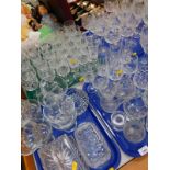 Cut and pressed glass ware, including wine glasses, sundae dishes, butter tubs, brandy balloons,