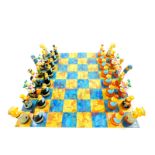 A The Simpsons novelty chess set, with chess board, c2002.