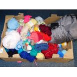 An assortment of knitting wool, knitting needles, etc., together with a back massager. (quantity)