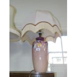 A Studio pottery table lamp, of fluted form, painted with blossom signed Dronmer, 61cm high.