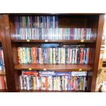 CDs, to include jazz, pop and easy listening, together with DVDs, films and comedy. (3 shelves)