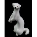 A Lomonosov porcelain figure of a standing ermine, printed mark, 19cm high.