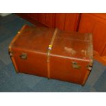 A canvas and wooden bound trunk., 47cm high, 84cm deep, 50cm wide.