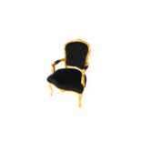 A 19thC gilt gesso button back armchair, with serpentine seat, upholstered in black fabric, raised