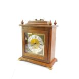 A German oak cased mantel clock, with a Haller eight day movement, Westminster chimes, 40cm high,