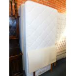 A single divan bed base, with a Sterling mattress and headboard. (3)