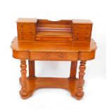 A Victorian mahogany Duchess dressing table, the upper section with one long and six short