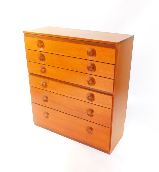 A Meredew teak chest, of seven long graduated drawers, raised on a plinth base, 113cm high, 102cm