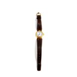 A Dunhill lady's stainless steel and gold plated wristwatch, circular white dial bearing Roman