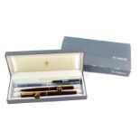A Parker cartridge and ball point pen set, 95 Laque, Thuya Medium, cased and outer boxed.