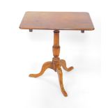 A George III mahogany occasional table, made-up, the rectangular top raised on a baluster turned