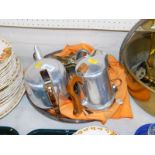 A Picquot ware teapot and water jug, plated knife rests, toasting fork, further plated wares, AA