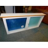 A white melamine display cabinet, 43cm high, 96cm wide, 13cm deep.