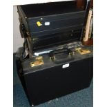 Six Modrec International black leather briefcases.