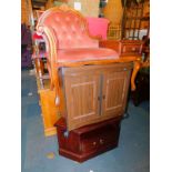 A reproduction mahogany telephone table, Phillips hostess trolley, and a Stag television stand. (3)