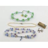 A Venetian glass necklace and a pair of clip earrings, bi-colour crystal two strand necklace,