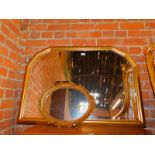 A gilt framed overmantel mirror, with bevelled plate, 101cm x 69cm, together with another oval