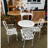A cast aluminium and white painted patio table, and four matching arm chairs. (5)