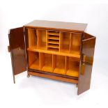 A His Master Voice HMV mahogany record cabinet, with a pair of bi-fold doors opening to reveal a