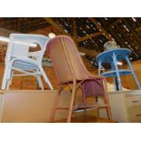 A blue painted Lloyd loom table, white painted wicker chair, and a gold painted wicker chair. (3)