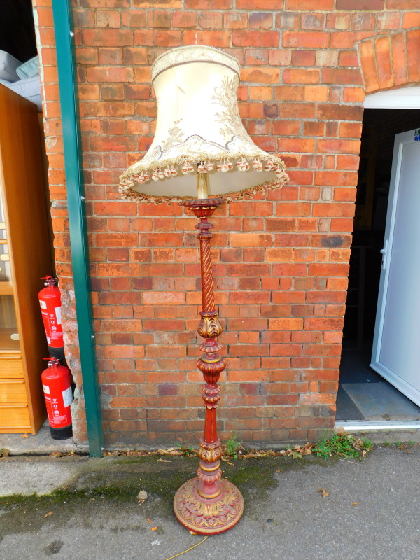 A Victorian red and gilt lacquer standard lamp, carved with acanthus leaves and egg & dart moulding,