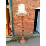 A Victorian red and gilt lacquer standard lamp, carved with acanthus leaves and egg & dart moulding,