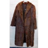 A minx full length fur coat.