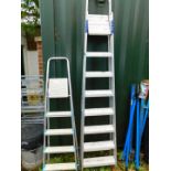 Two aluminium step ladders.