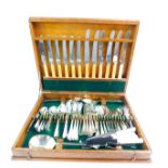 An oak canteen box, containing silver plated and stainless steel flatware, assorted patterns, etc.