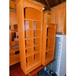 A teak effect square bookcase, 96cm high, 43cm wide, 40cm deep., together with a matching pigeon