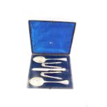 A Victorian silver plated fruit set, comprising a pair of berry spoons, a pair of nutcrackers, and a