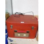 A Baird record player with Garrard deck, model RC120/4H, red cased, 44cm wide.
