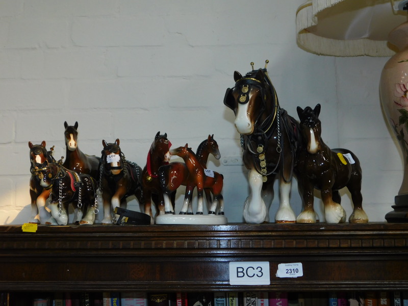 Pottery figures of shire and other horses. (8)