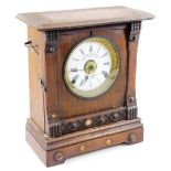 Fattorini. An early 20thC oak cased alarm mantel clock, the shaped case with raised beading on a